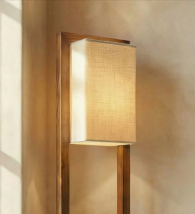 Biped Wooden Floor Lamp with Brown Base and Beige Fabric Lampshade
