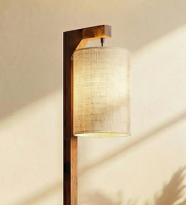 Elementary Wooden Floor Lamp with Brown Base and White Fabric Lampshade